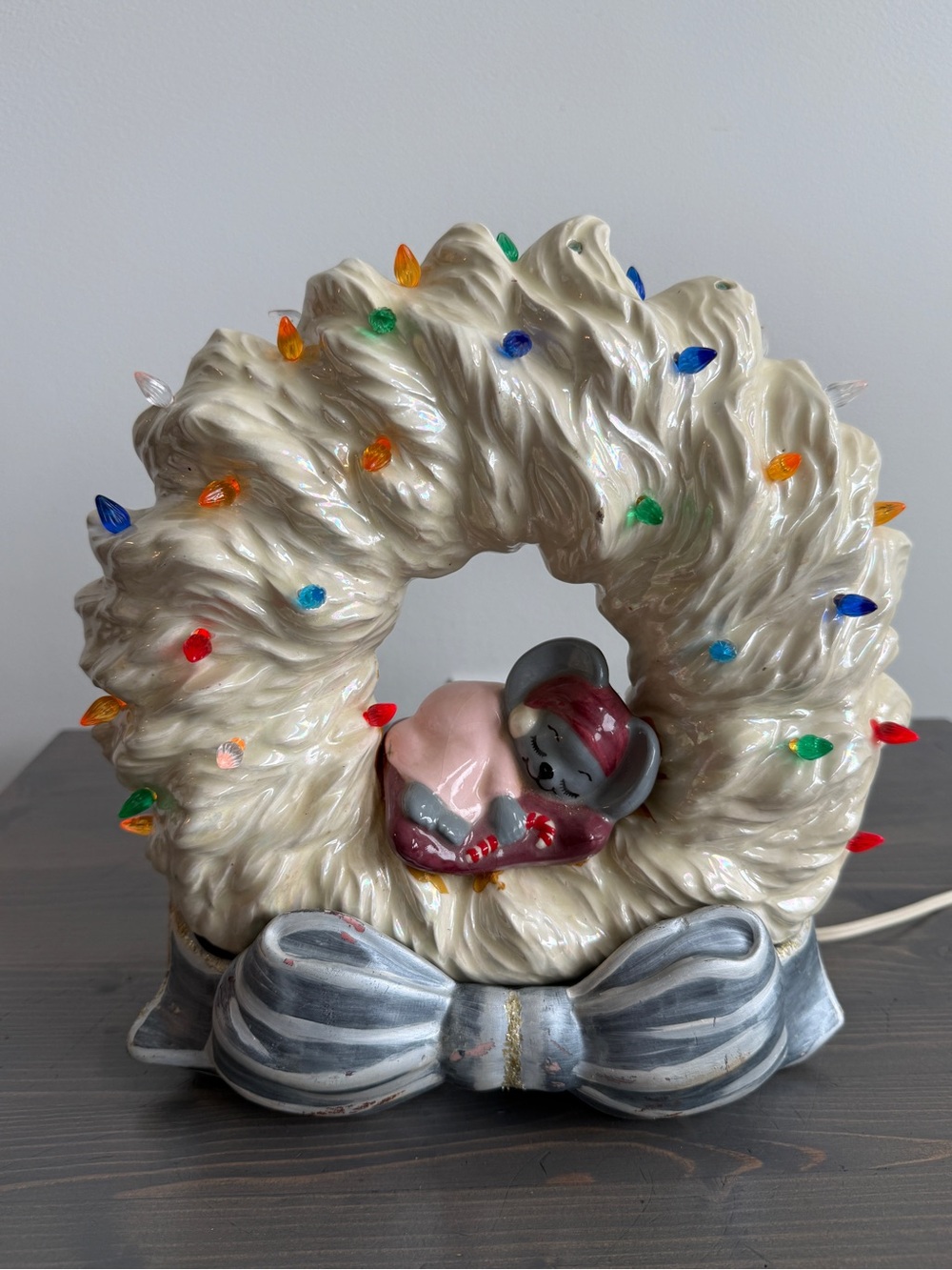 Vintage Tampa Bay ceramic wreath mold
with sleeping Christmas mouse